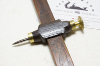 FINE TWO TONED MAHOGANY AND BRASS TRAMMEL POINTS