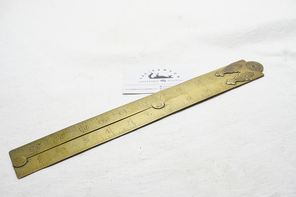 RARE EARLY RABONE BRASS FOLDING RULE WITH DECORATIVE HINGE