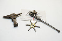 EXQUISITE SET OF EARLY JEWELLERS STAKE ANVIL, HAND VISE AND WATCH KEY