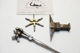 EXQUISITE SET OF EARLY JEWELLERS STAKE ANVIL, HAND VISE AND WATCH KEY