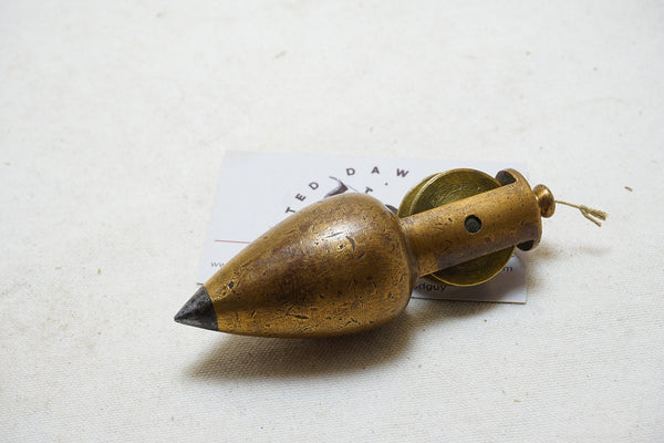 STANLEY NO. 1 STEEL TIPPED BRASS PLUMB BOB WITH INTEGRATED REEL