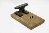 MINIATURE BRIDGE STYLE ANVIL ON WOOD BASE