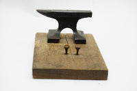 MINIATURE BRIDGE STYLE ANVIL ON WOOD BASE