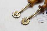GORGEOUS PAIR OF BRASS FRAMED STITCH MARKING WHEELS