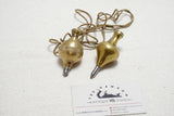 TWO SWEET BRASS PLUMB BOBS