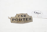 FINE VINTAGE CNR PORTER HAT BADGE